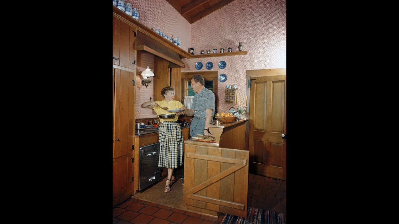 Williams and her husband, Ben Gage, prepare dinner circa 1950. 