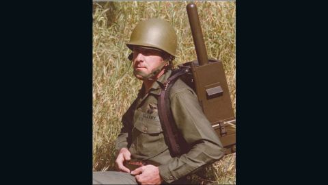 The original 'Manpack' GPS, modeled by the GPS program's army deputy, Paul Weber. The pack weighed about 40 pounds and cost over $400,000. Today GPS units are smaller than a fingernail and cost $1.50