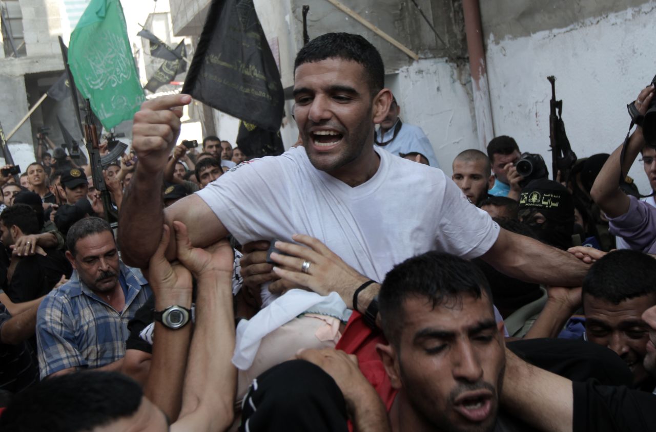 Sarsak's eventual release in July 2012 sparked scenes of wild celebration. This picture shows his return to his hometown of Rafah.