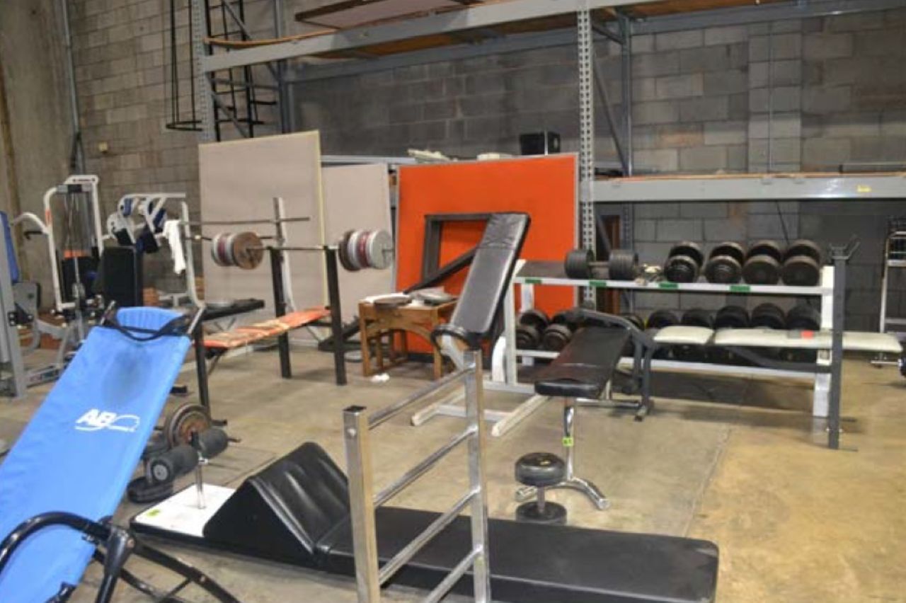 The warehouse also contained an extensive gym with weights and updated equipment.
