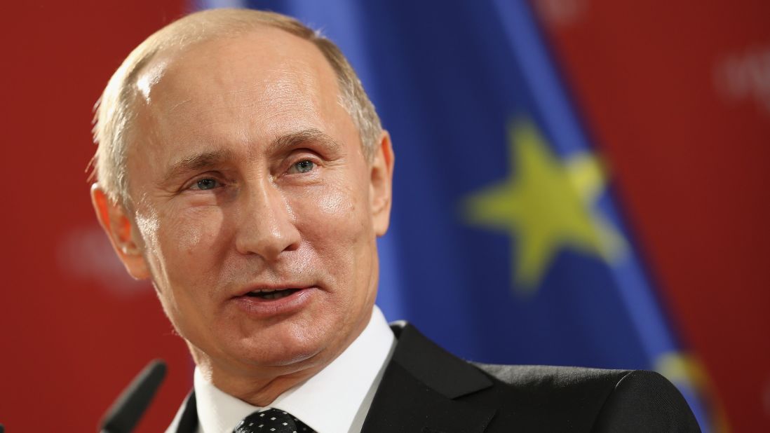 Putin addresses the media during his visit to Hanover.