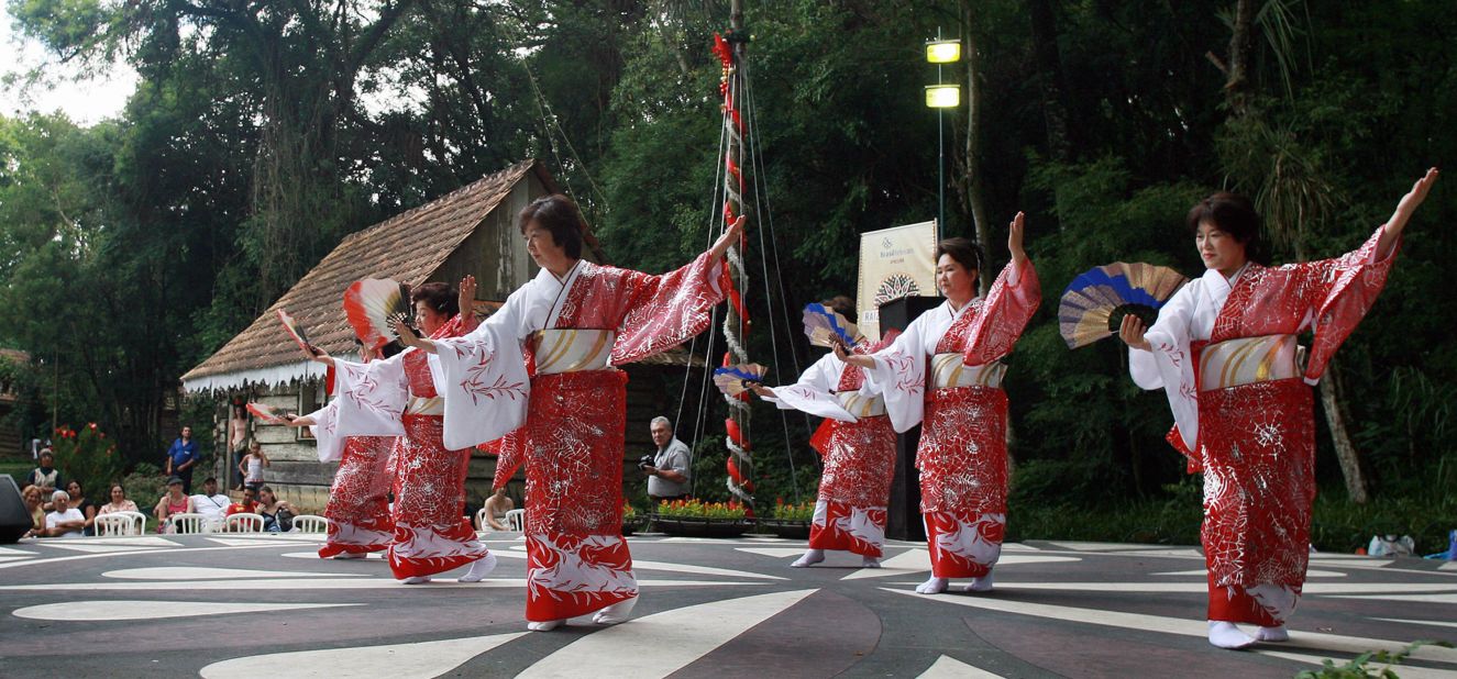 Japanese descendants perform a traditional dance during the Ethnic Dance festival in Curitiba, Brazil. The country is home to 1.8 million ethnic Japanese, the largest community outside Japan.