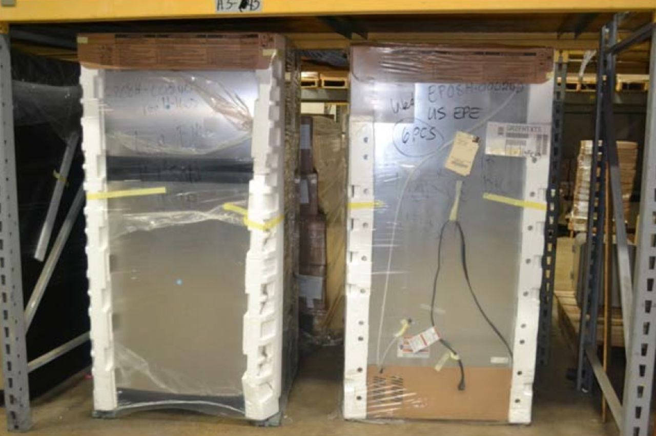The report also alleges that valuable inventory was going unused, like these unopened refrigerators recieved in 2007 in original wrapping. 