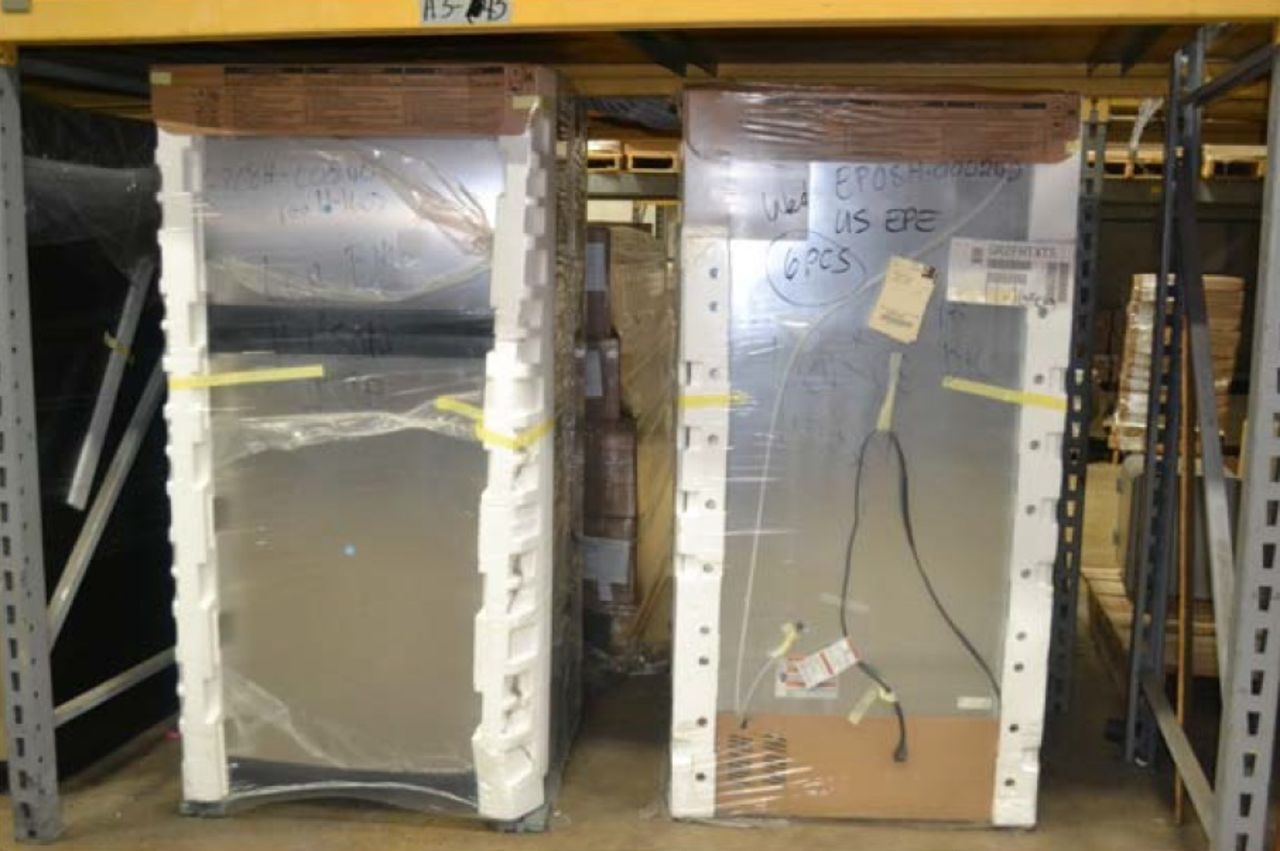 The report also alleges that valuable inventory was going unused, like these unopened refrigerators recieved in 2007 in original wrapping.