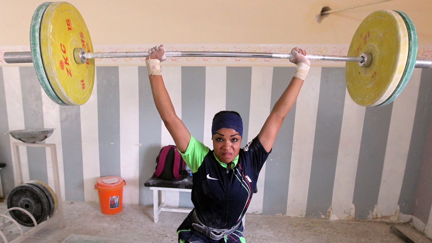 Rising to the challenge: A member of Iraq's first national female weightlifting team.