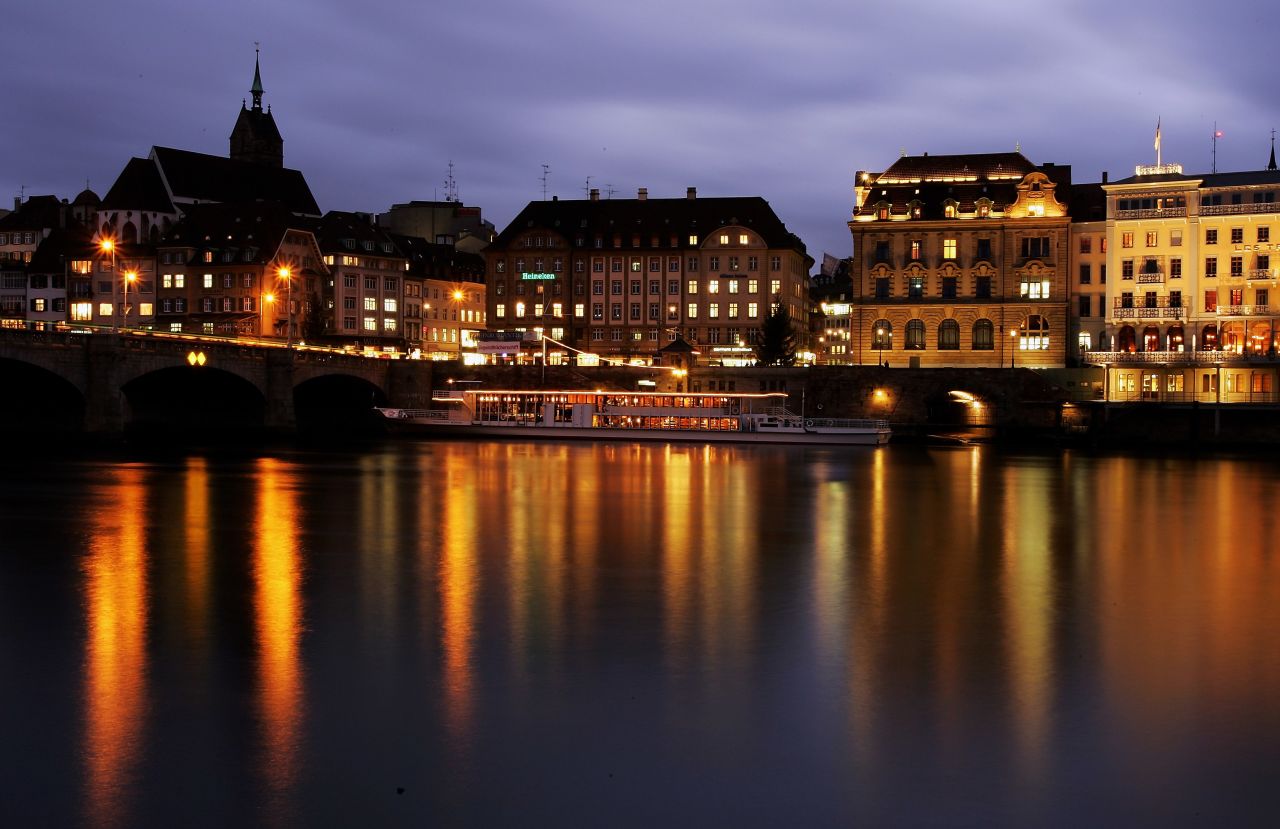 On the border with Germany, the Swiss city of Basel rose two notches to be the ninth most expensive city for expats. Here, the Old Town of Basel is seen next to the river Rhine. 