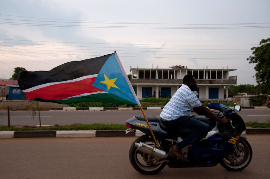 South Sudan's capital of Juba is the fourth priciest city for overseas workers. The country only gained independence from Sudan in 2011 and jumped forty-one spots since ECA's 2012 survey. In this photo, a man rides a motorbike with a South Sudanese flag during celebrations in the streets of Juba ahead of South Sudan's independence first anniversary, on July 8, 2012. 