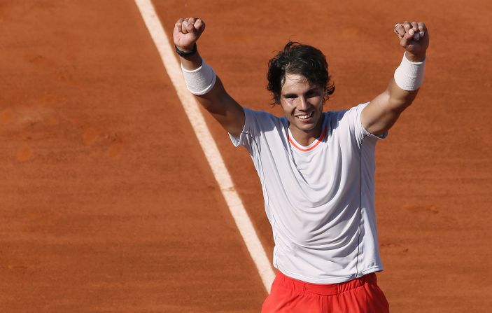 Spain's Rafael Nadal celebrates after defeating Serbia's Novak Djokovic during a French Open semifinal match in Paris on June 7. Nadal won 6-4, 3-6, 6-1, 6-7(3), 9-7.