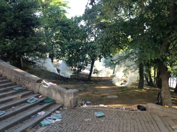 An <a href="index.php?page=&url=http%3A%2F%2Fireport.cnn.com%2Fdocs%2FDOC-982570">iReporter </a>who wished to remain anonymous sent in this image of smoke or tear gas canisters in a park in Istanbul Saturday.