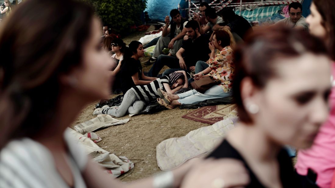 Protesters rest in Gezi Park next to Taksim Square during a demonstration in Istanbul on Friday, June 7.