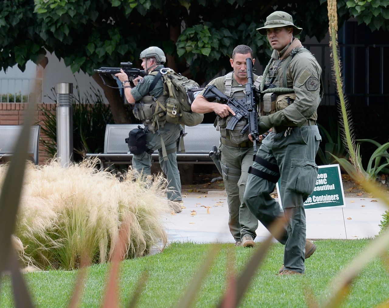 Los Angeles County Sheriff deputies search the grounds.