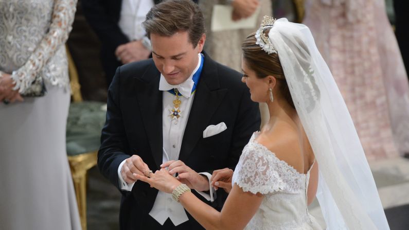 Princess Madeleine of Sweden and Christopher O'Neill exchange rings during the wedding ceremony.