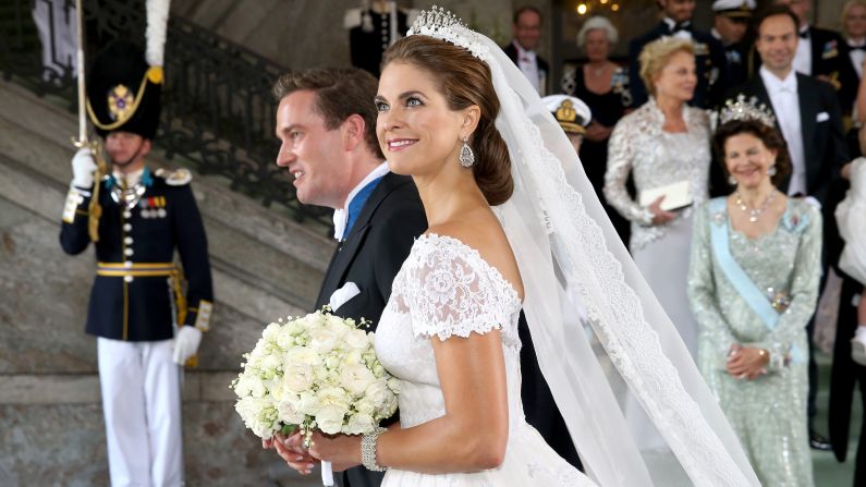 Princess Madeleine of Sweden and Christopher O'Neill leave the ceremony.
