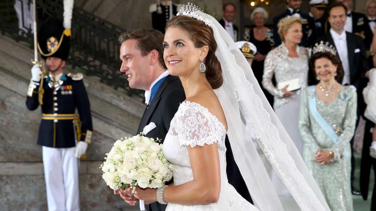 Princess Madeleine of Sweden and Christopher O'Neill leave the ceremony.