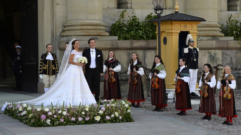 The newlyweds pose after leaving the Royal Chapel.