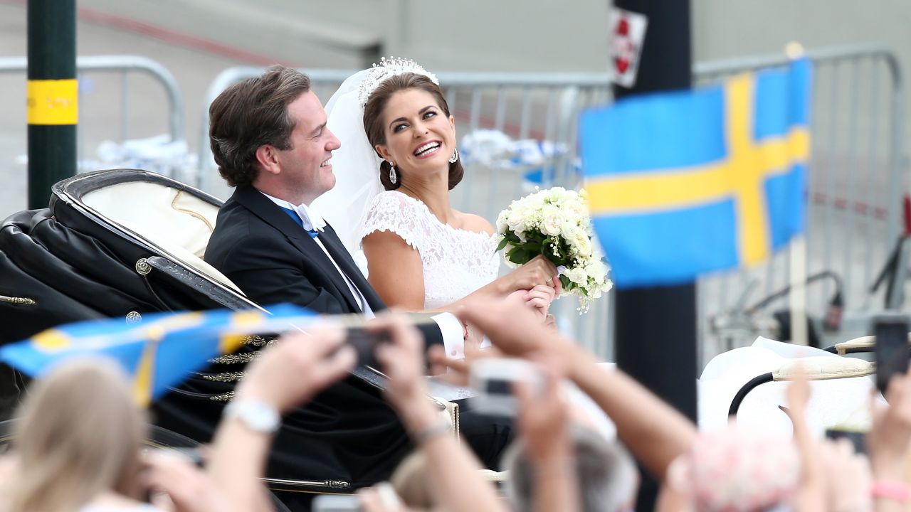 Christopher O'Neill and Princess Madeleine of Sweden are taken by horse and carriage from the Royal Palace of Stockholm to Riddarholmen after the wedding.