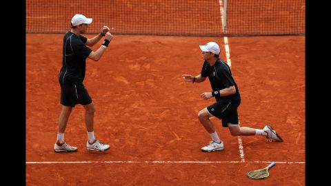 Bob, right, and Mike Bryan celebrate the match point.