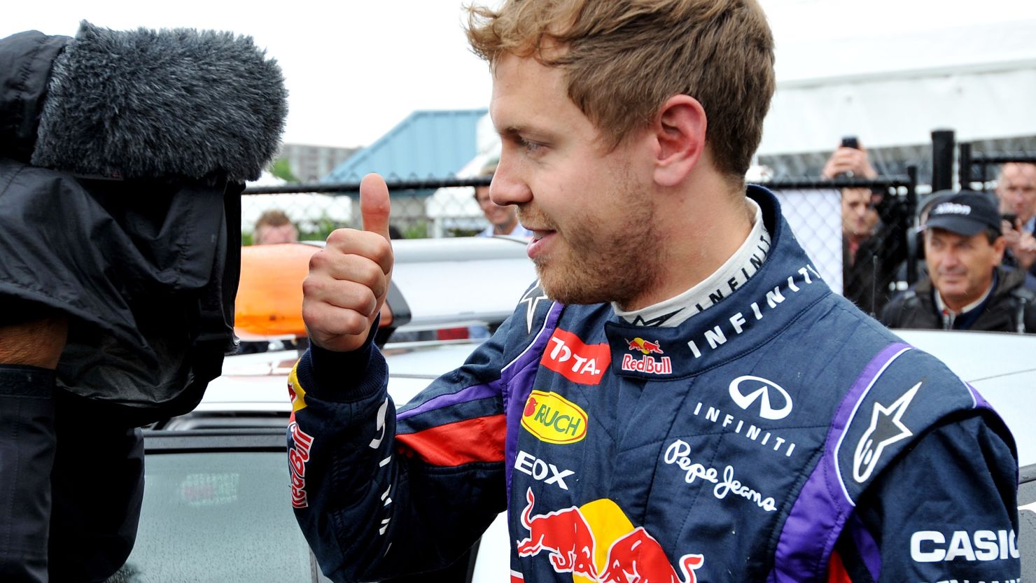 Sebastian Vettel gives his traditional thumbs up after claiming pole for the Canadian Grand Prix.