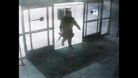 This photo, released by the Santa Monica Police department, shows the gunman entering the Santa Monica College library on June 7.  The gunman's shooting spree began in a home near the college, where two were found dead, and ended when police killed him in the college library. Santa Monica police have identified the suspect as John Zawahri. 