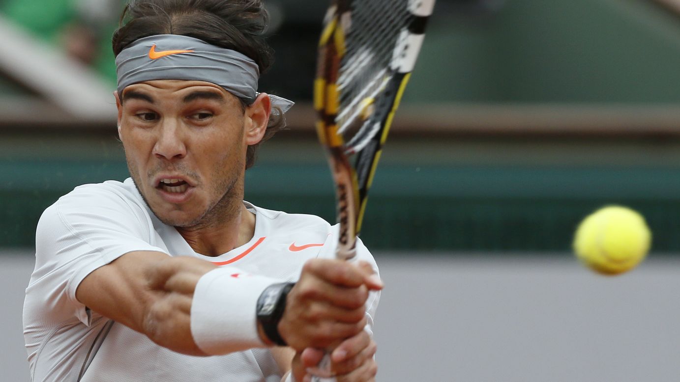 Nadal returns to Ferrer.