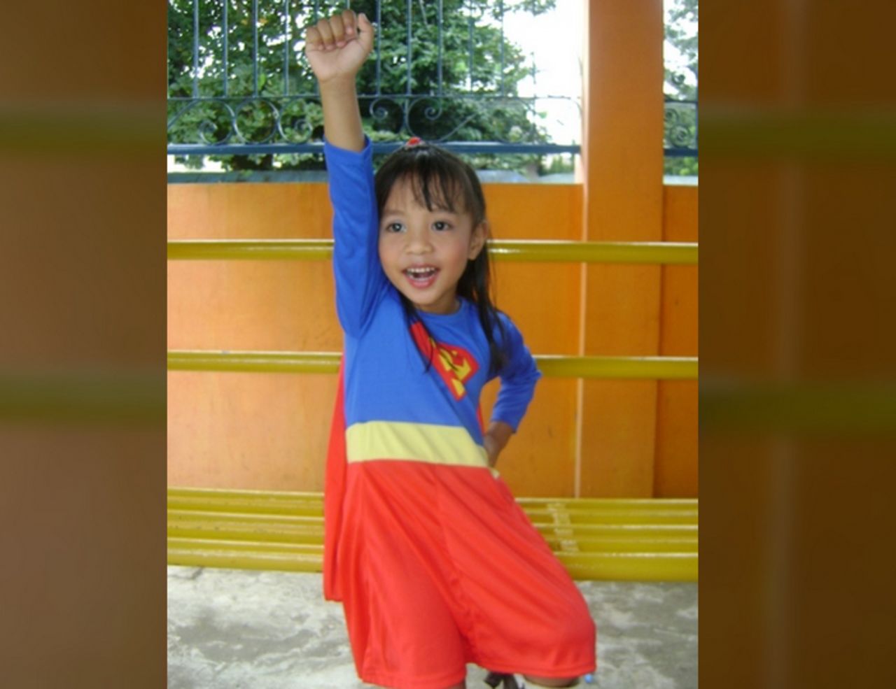 <a href="http://ireport.cnn.com/docs/DOC-979832">Socrates Ballais</a> photographed his daughter, Iyah, dressed as "Supergirl" for a school presentation. Both he and his daughter are huge superhero fans.  When Iyah wears the Superman cape, she believes she really has superpowers. "She has no fear of heights, and thinks she is as powerful as Superman. I keep on reminding her that acting like Supergirl is just like a pretend play. She does not believe it," he said. "I had to make sure that I am around when she dons the Supergirl attire."