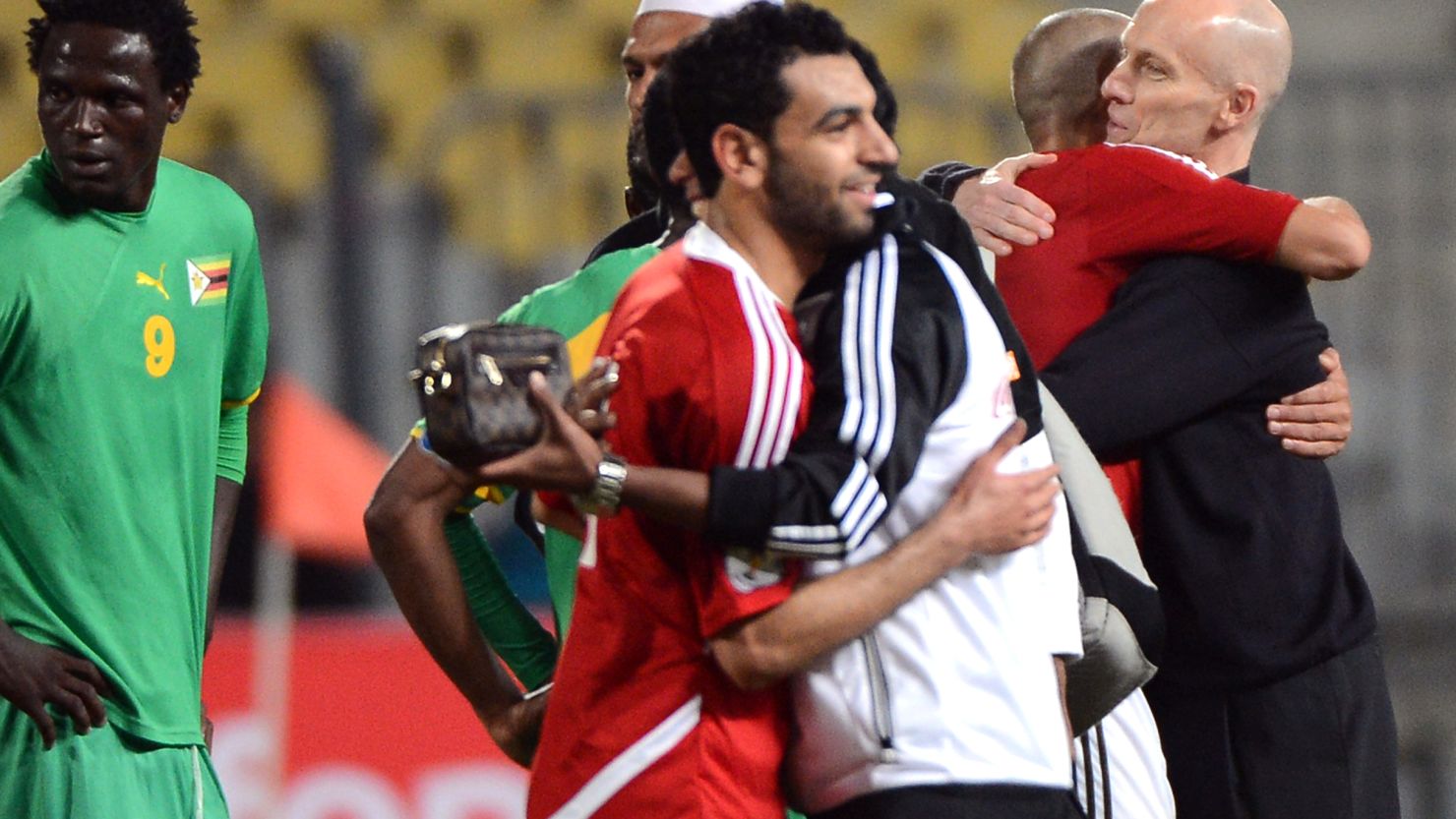 Mohamed Salah is congratulated by the Egpyt coaching staff after his hat-trick in the win over Zimbabwe