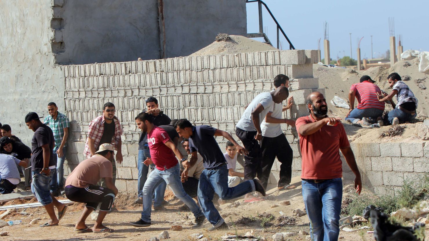 Libyan protesters are pictured during clashes with the Libyan Shield brigade on Saturday.