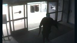 This photo, released by the Santa Monica Police department, shows the gunman entering the Santa Monica College library on June 7.  The gunman's shooting spree began in a  home near the college, where two were found dead, and ended when police killed him in the college library.