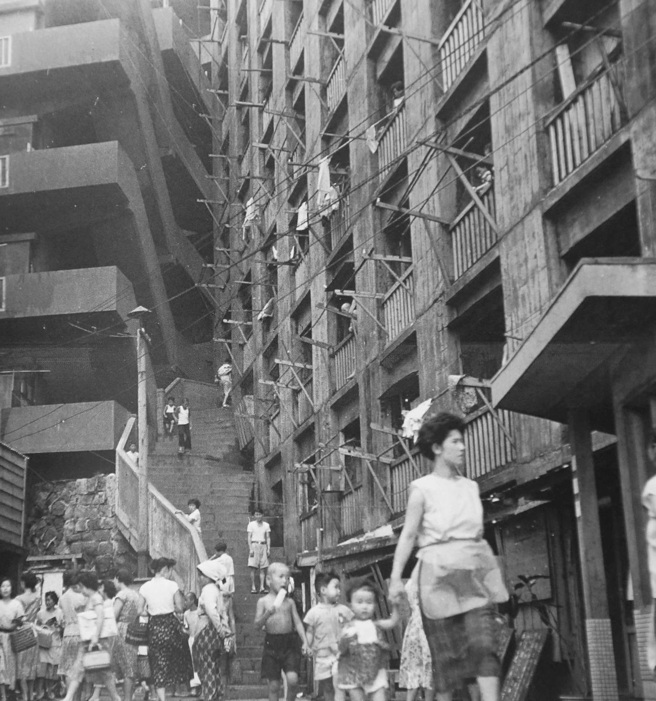 Archive photograph from before World War II shows the steep stairs leading into the warren of apartments inside the huge housing blocks on Hashima.