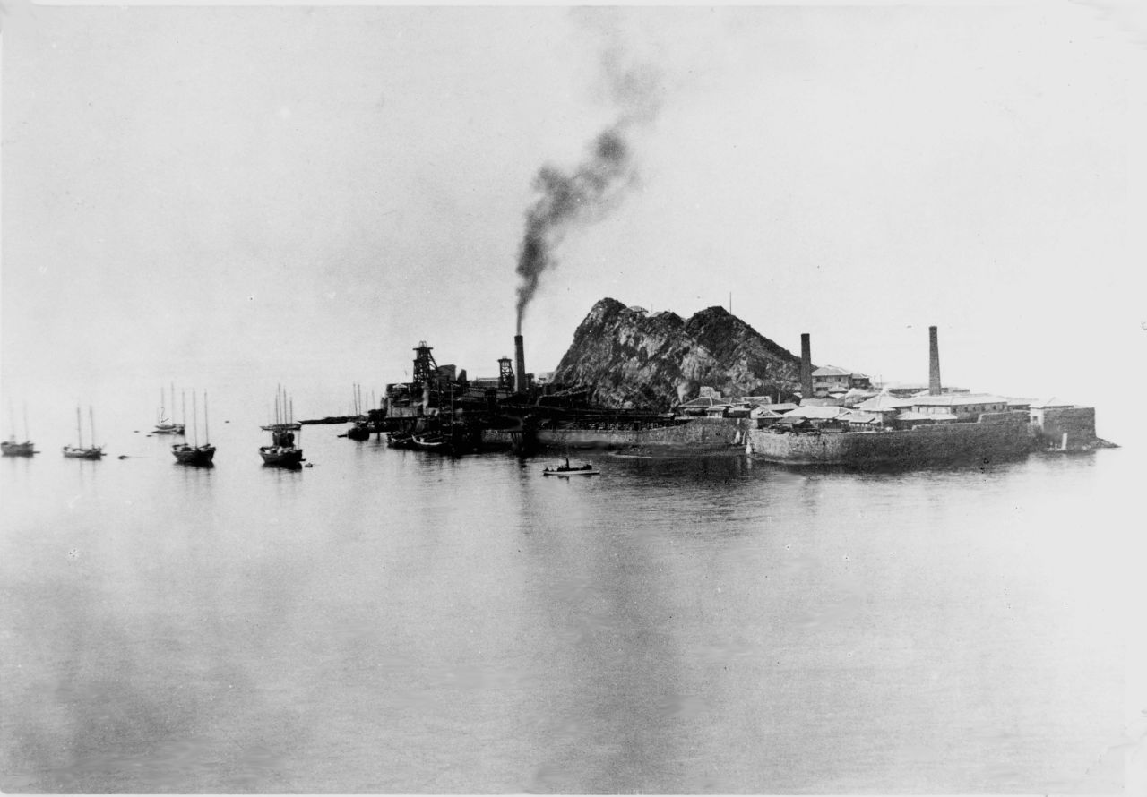 Image from the late 1800s shows Hashima developing its coal mining facility.