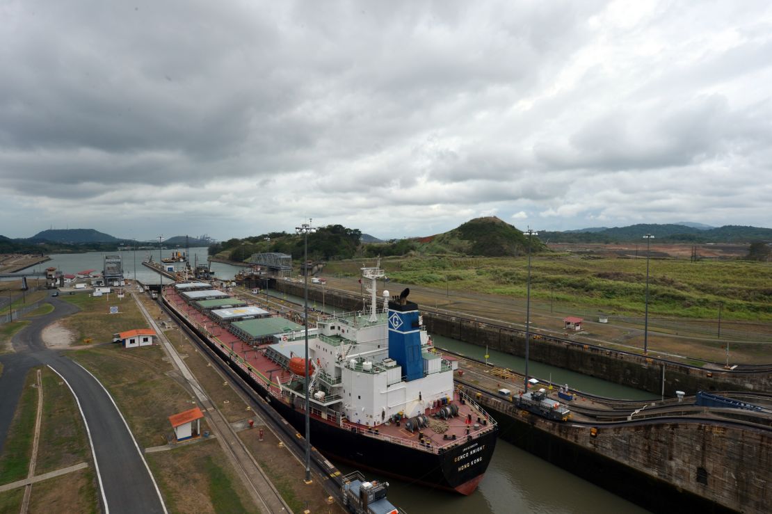 A ship passes through the Miraflores Locks on the Panama Canal.