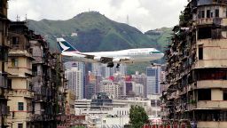 Probably the most iconic shot of Kai Tak International Airport --a departing Cathay Pacific's flight captured in between the walk-up buildings in Kowloon City.
Daryl Chapman, a 40-year-old photographer, recalled, "That photo was taken in To Kwa Wan just at the entrance of the airport tunnel (now Kai Tak tunnel)."