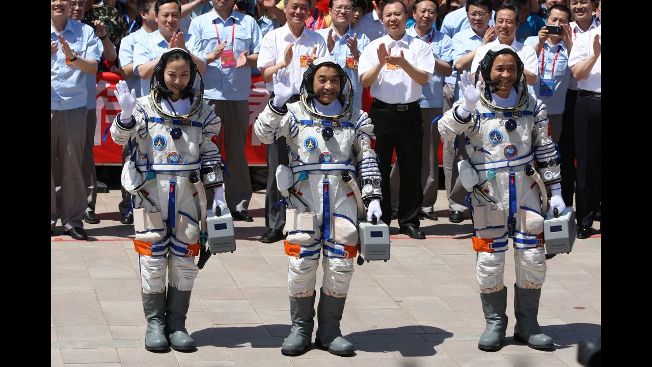 Yaping, Xiaoguang and Haisheng wave on June 11.