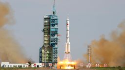 China's Shenzhou 10 rocket blasts off from the Gobi Desert in the city of Jiuquan, in  China's Gansu province, on Tuesday, June 11. The craft is scheduled to dock with the Tiangong-1 space module, where the three crew members will transfer supplies to the space lab, which has been in orbit since September 2011. 