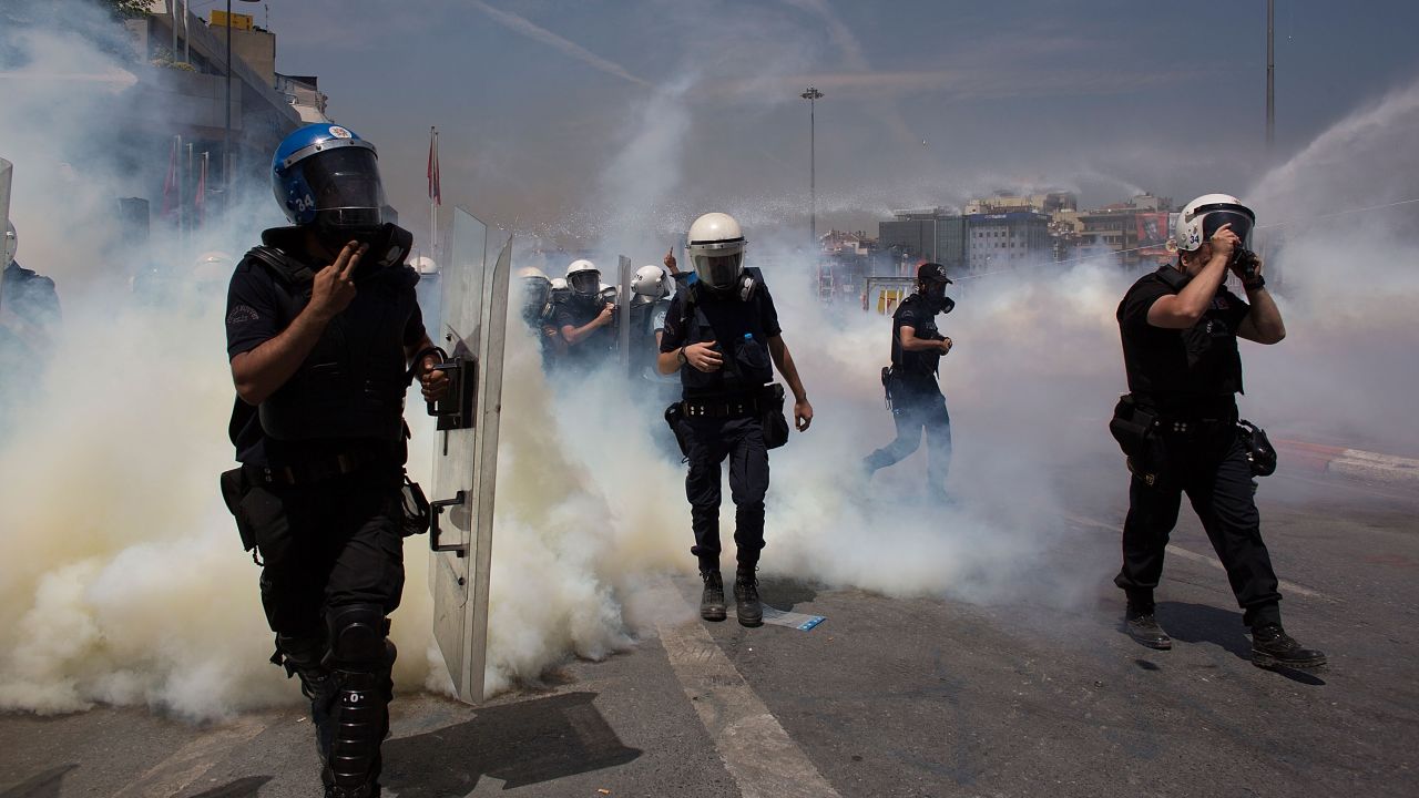 Riot police use water cannons and tear gas to disperse a crowd near Istabul's Taksim Square on June 11.