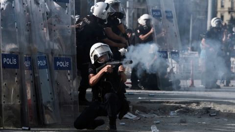 Riot police fire tear gas at demonstrators in Taksim Square on June 11.