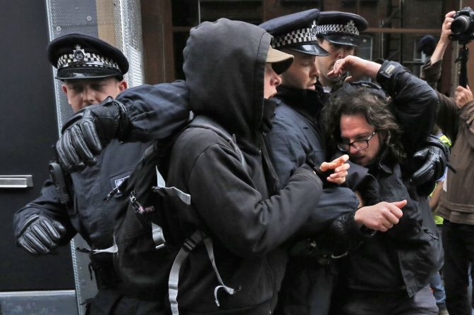 Protesters scuffle with police on June 11.