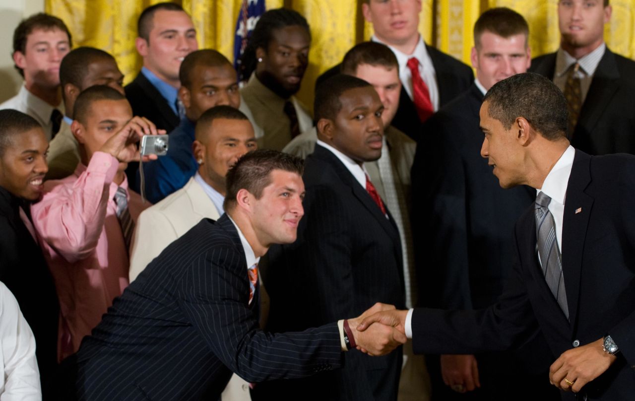 President Barack Obama shakes hands with Tebow at the White House during an April 2009 ceremony that honored the Gators for their national championship.