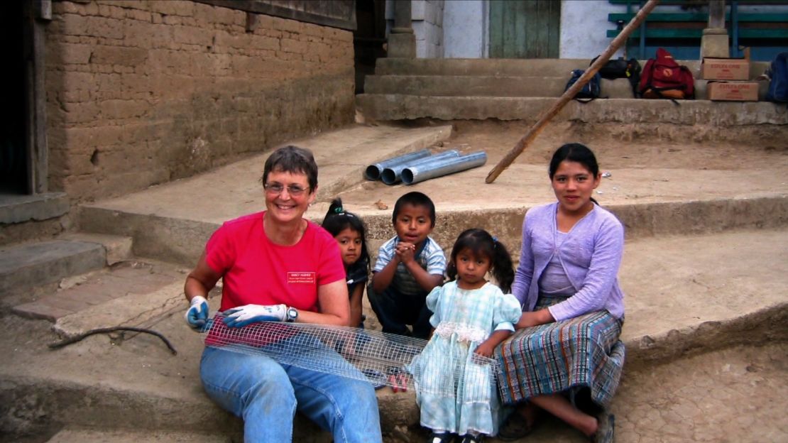 Nancy Hughes, left, spent years working with engineers on a cleaner portable stove.