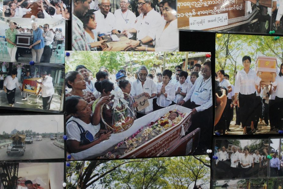 Photos line the walls of the FFSS headquarters. This one shows the 100,000th woman buried by the society which started offering free funeral services in 2001.