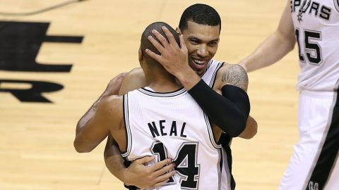 Danny Green of the San Antonio Spurs celebrates with teammate Gary Neal as they take on the Miami Heat during Game 3 of the 2013 NBA Finals on Tuesday, June 11, in San Antonio. The Spurs defeated the Heat 113-77 and lead the series 2-1. <a href="http://www.cnn.com/2013/06/09/us/gallery/nba-finals-game-2/index.html">See photos from Game 2</a>.