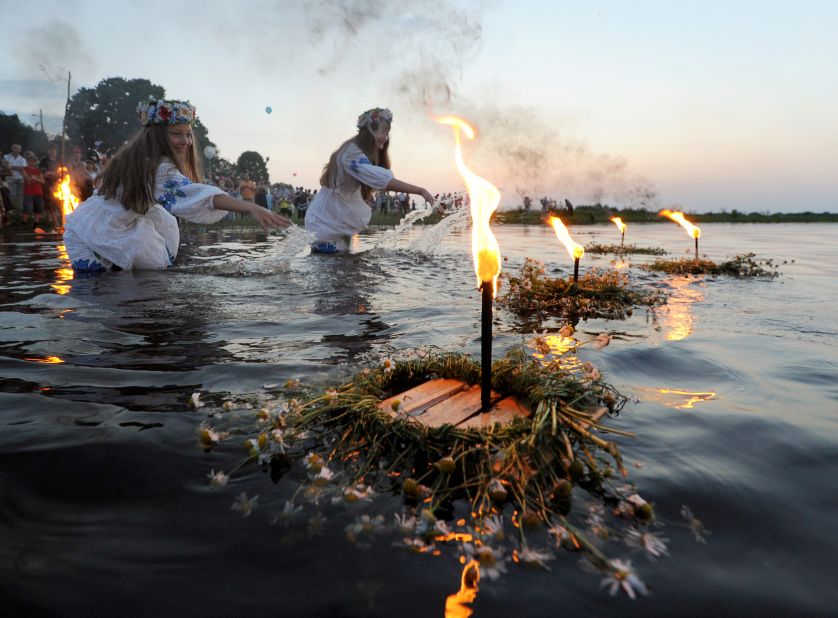 In neighboring Belarus, girls place candle offerings into rivers as they celebrate Ivan Kupala Day. The pagan tradition has been accepted into the Orthodox Christian calendar.