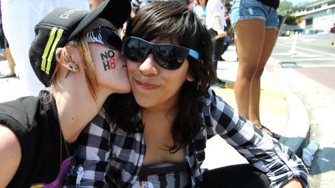 Shannon Cram kisses her girlfriend Michelle Molina at the 43rd Los Angeles Pride Parade on June 9.
