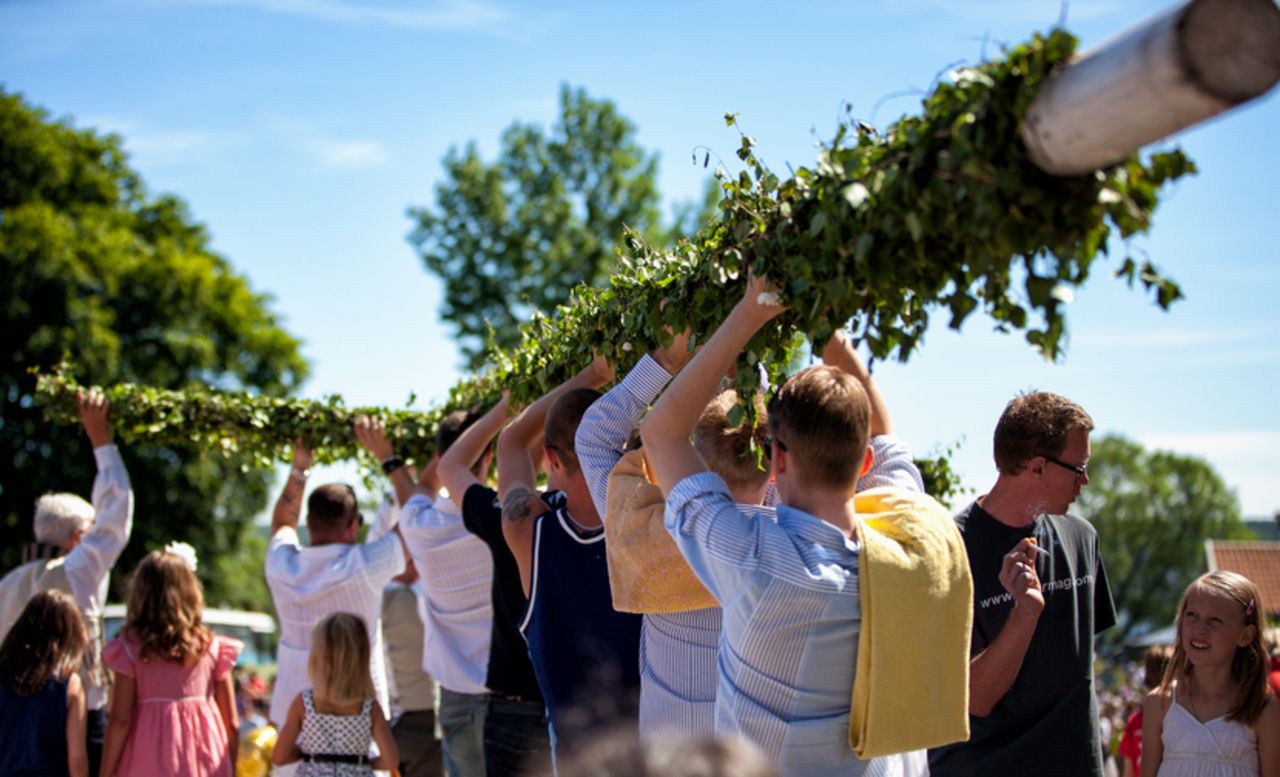 In Sweden, where Midsummer is one of the biggest celebrations of the year, singing and dancing are central to the fun and frolics. But before all that the maypole has to be decorated and raised. <a href="http://ireport.cnn.com/people/ulfbodin" target="_blank">Ulf Bodin</a> took this photo in the small town of Sigtuna, an hour north of Stockholm. 