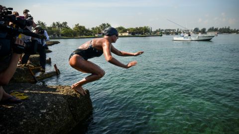 Australian swimmer Chloe McCardel dives from Marina Hemingway in Havana, on June 12, 2013.