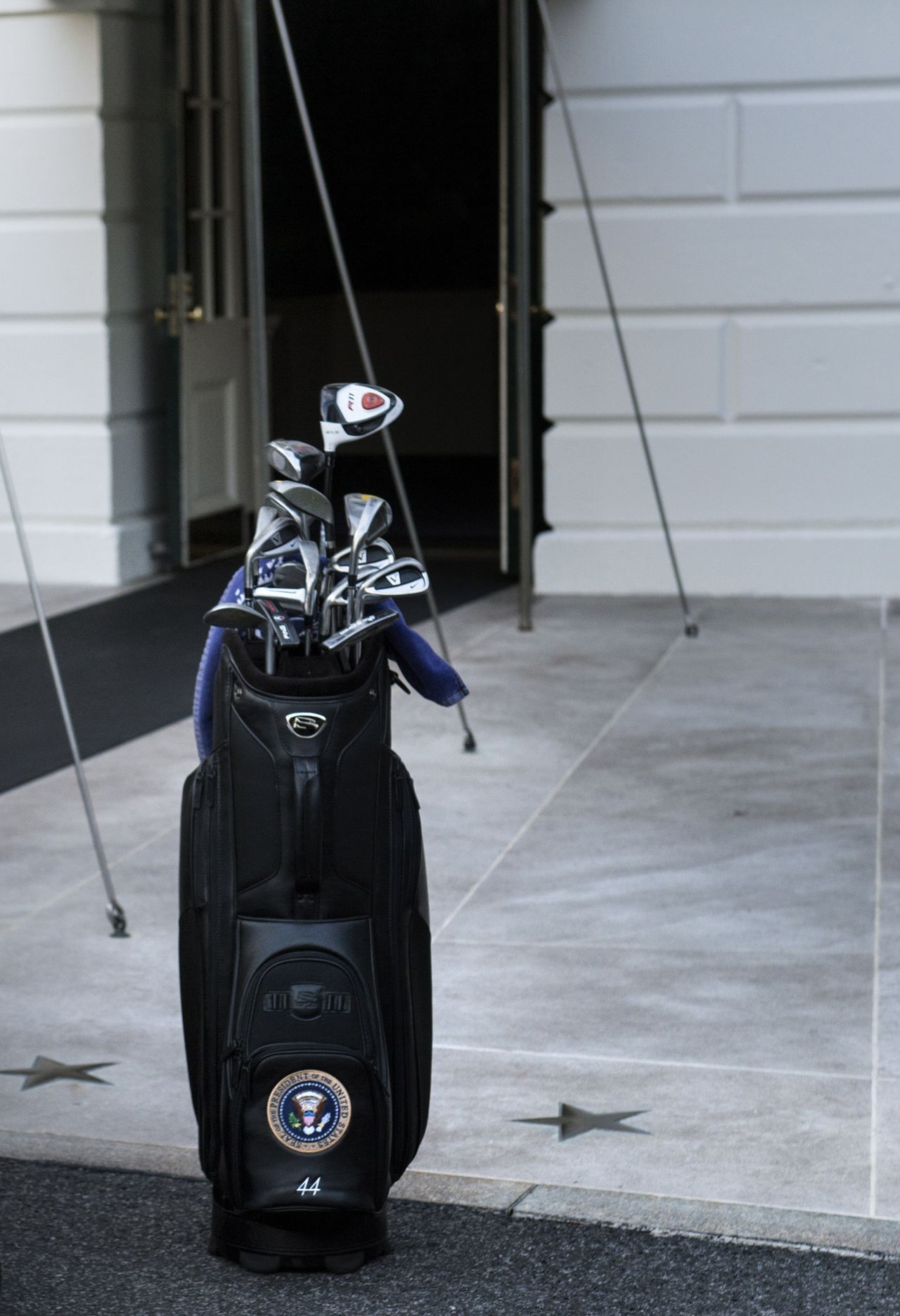 Obama spent the weekend after his re-election in 2012 playing golf at Andrews Air Force Base in Washington. His clubs are seen here in front of the entrance to south portico of the White House, with the number 44 stitched into the bag representing his place in the line of U.S. presidents.