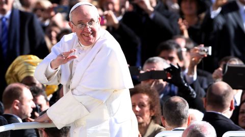 (File) Pope Francis waves to the crowd of faithful as he arrives in St. Peter's Square on March 19 in Vatican City.