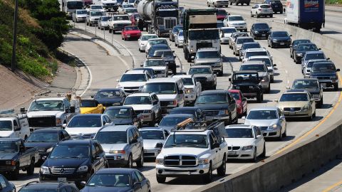 Commuters move slowly  in Los Angeles. Studies show that talking to your car's voice technology impairs driving.
