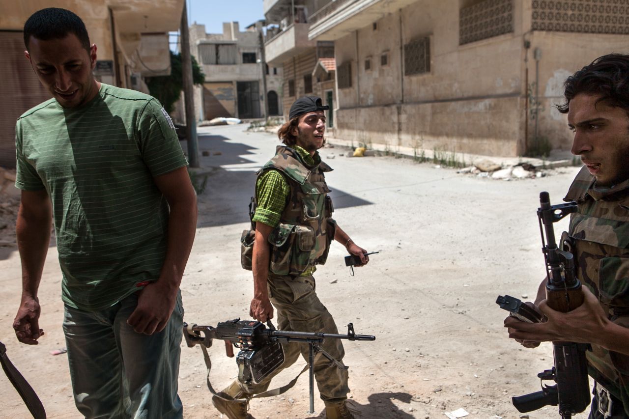 Syrian rebels leave their position in the northwestern town of Maaret al-Numan on Thursday, June 13. The White House said that <a href="http://www.cnn.com/2013/06/13/politics/syria-us-chemical-weapons/index.html">the Syrian government has crossed a "red line"</a> with its use of chemical weapons and announced it would start arming the rebels.