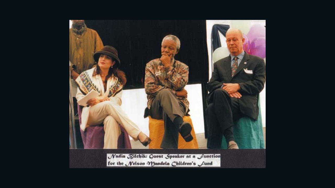 Nadia Bilchik attends an event with Nelson Mandela.